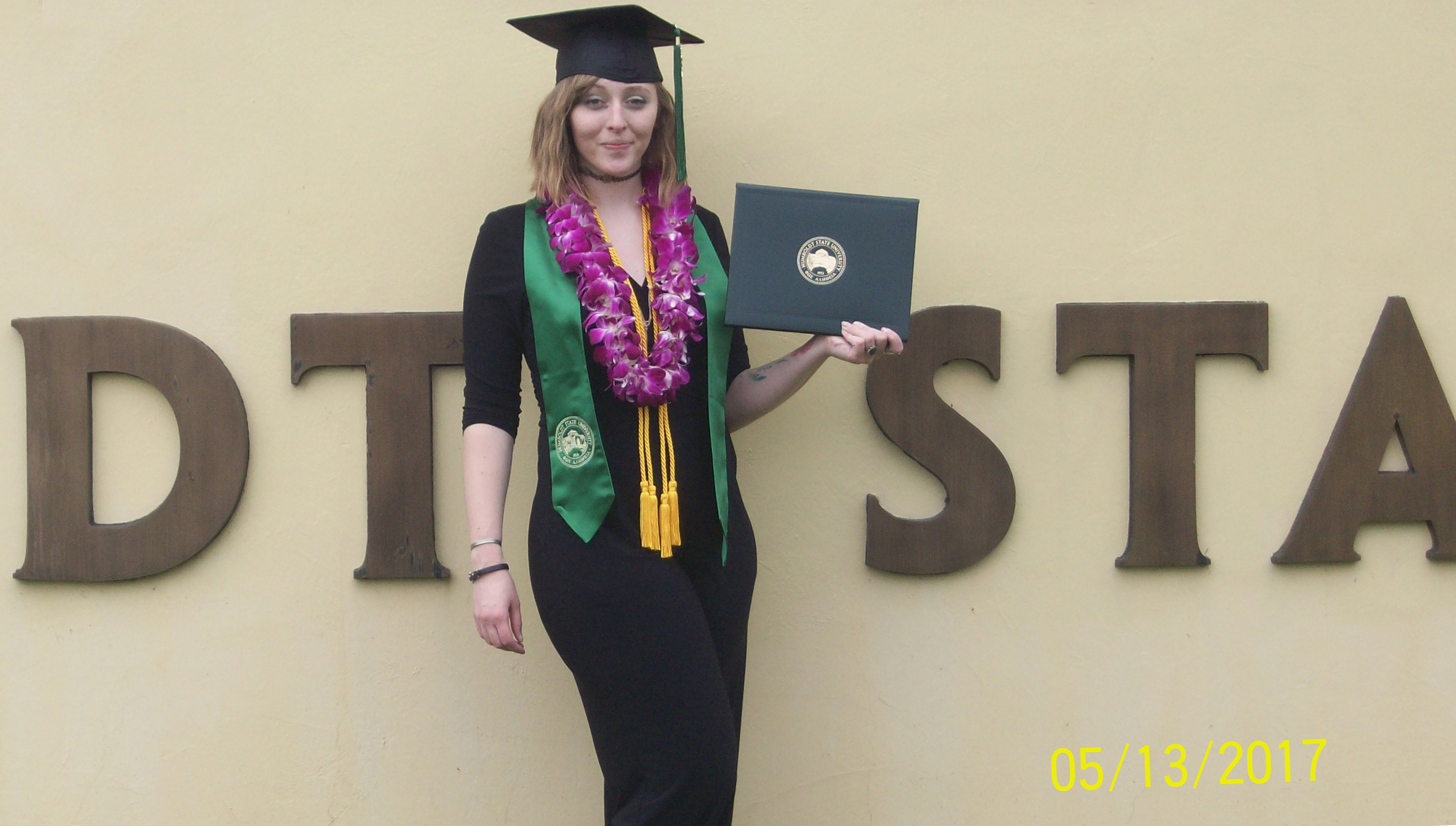Erin Henry awarded degree, honored and remembered